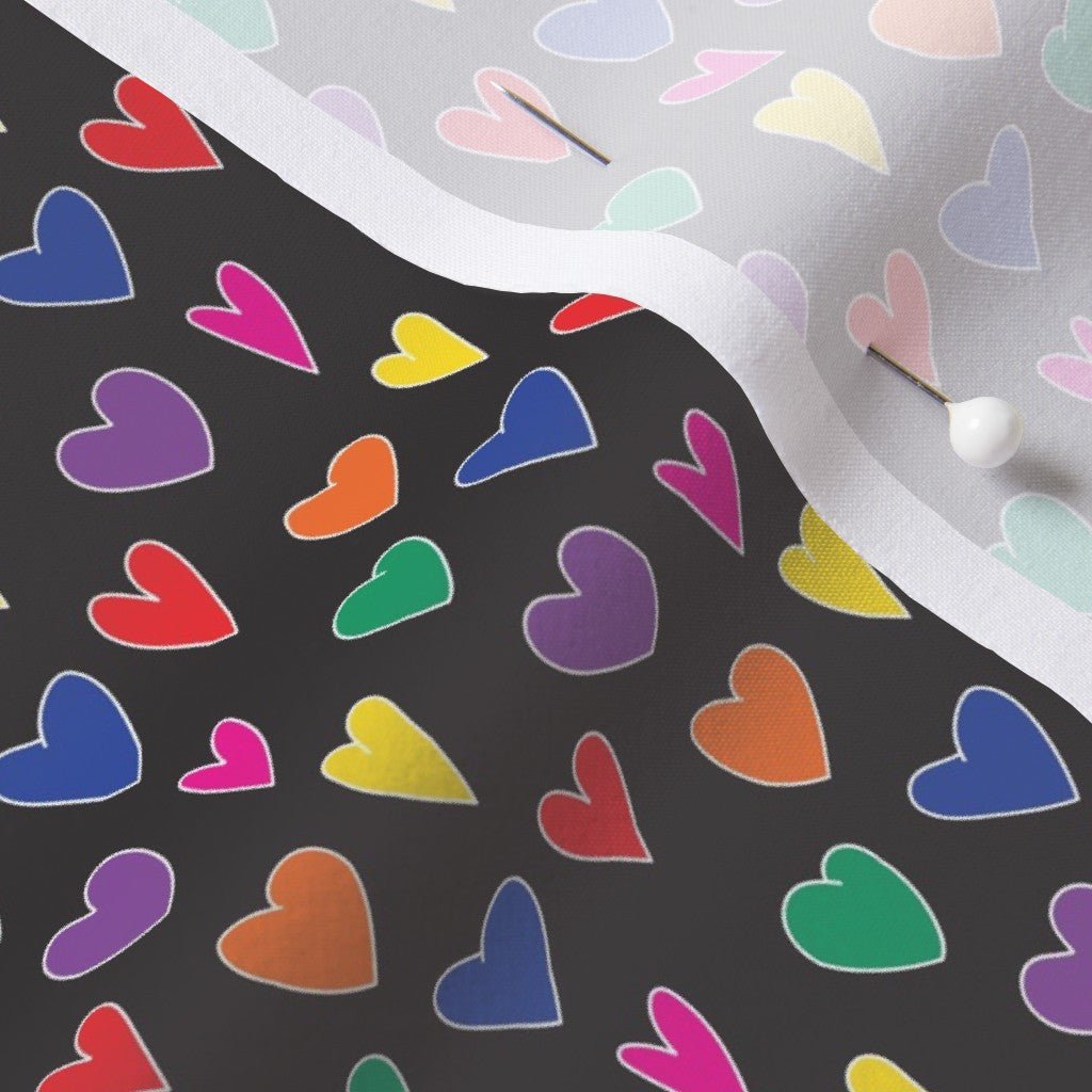 Mini Rainbow Hearts Black Sport Stretch Woven Printed Fabric by Studio Ten Design