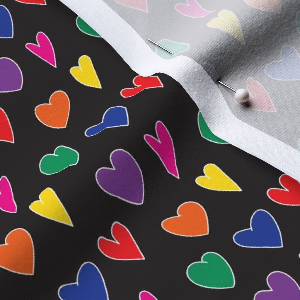 Mini Rainbow Hearts Black Cotton Spandex Jersey Printed Fabric by Studio Ten Design