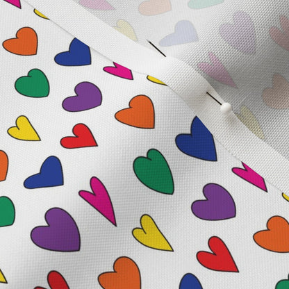 Mini Rainbow Hearts WhiteRecycled Canvas Printed Fabric by Studio Ten Design