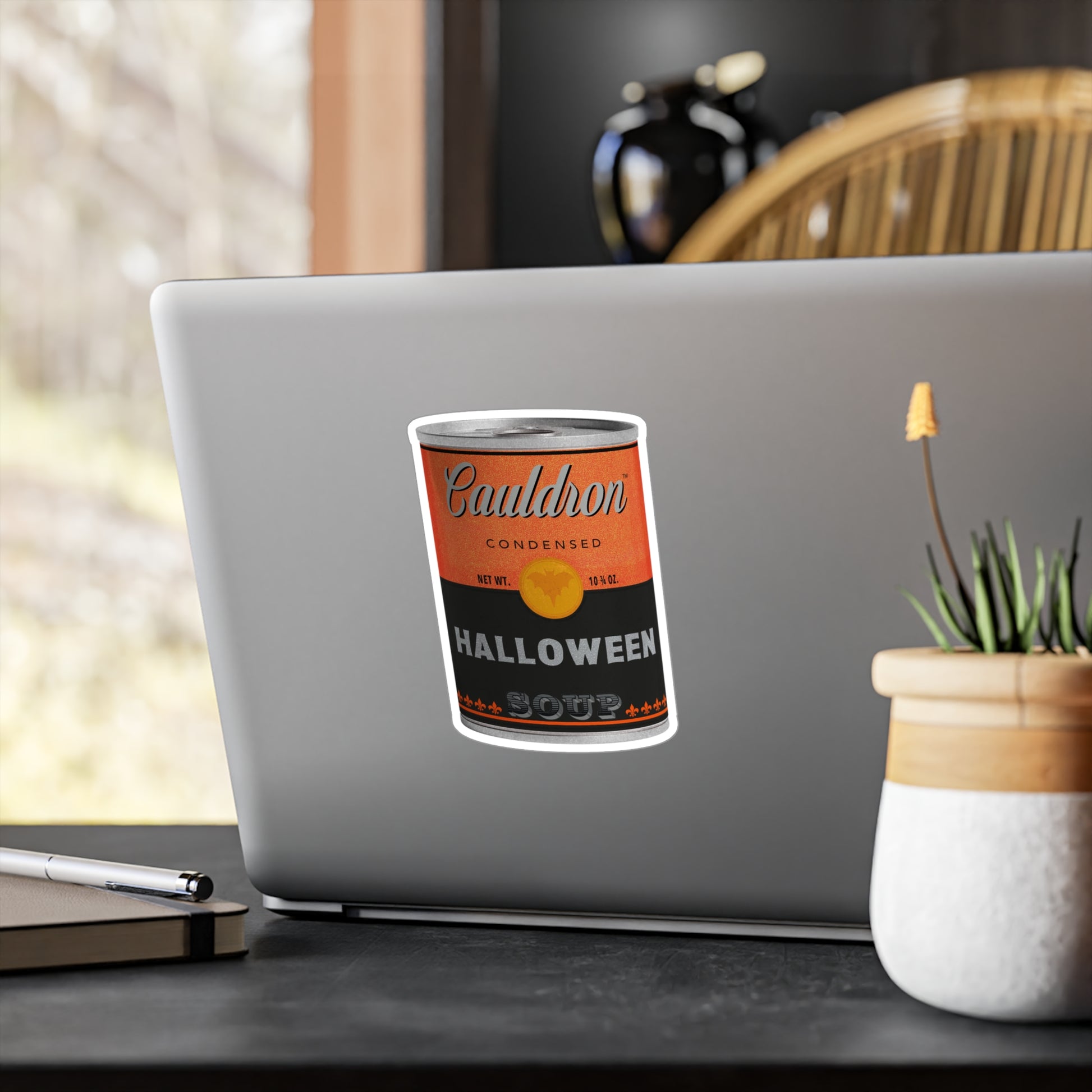 Cauldron Brand Halloween Soup Kiss-Cut Vinyl Decal (4x6 inch; shown on laptop) by Studio Ten Design