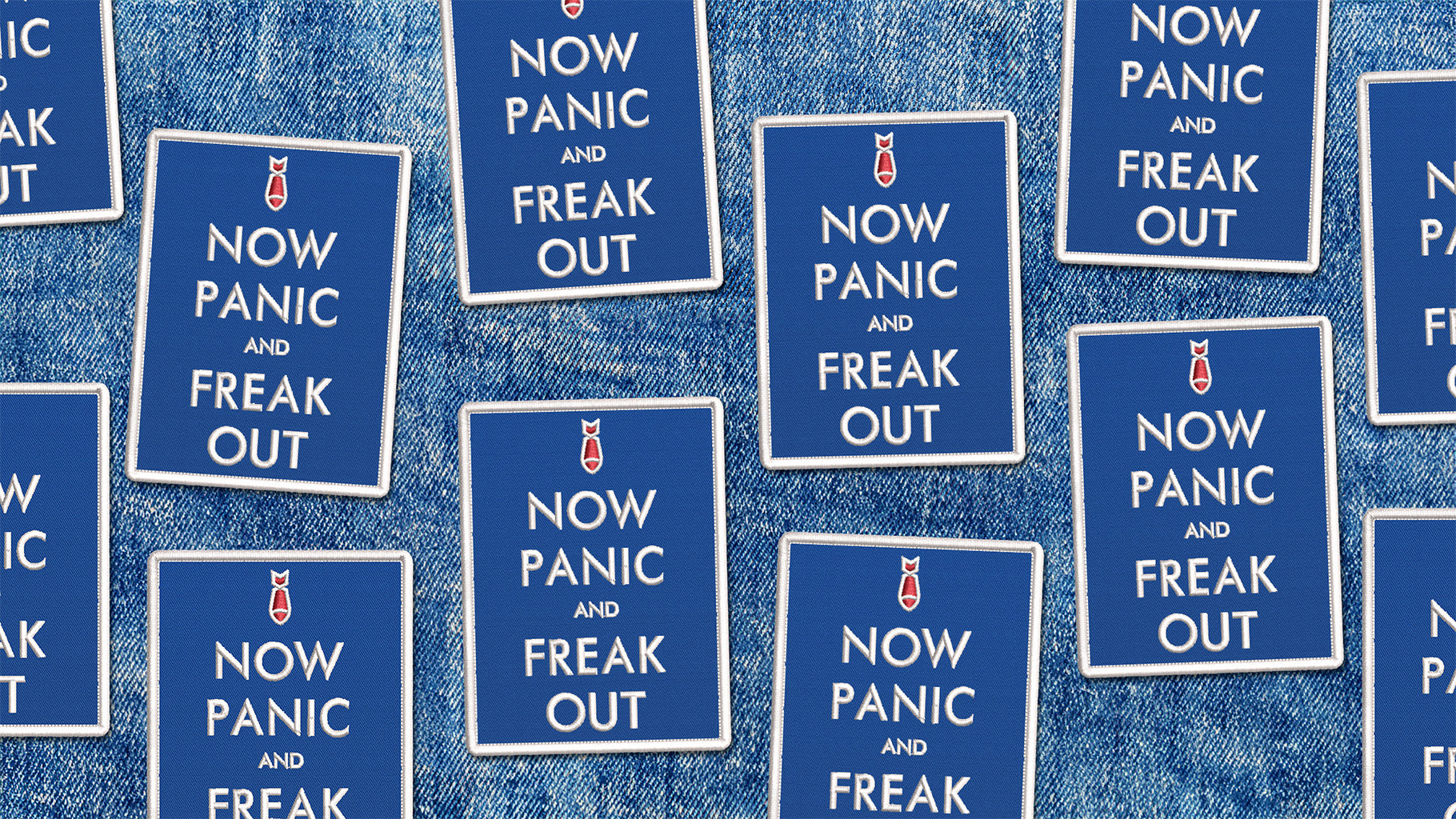 Now Panic and Freak Out (Blue) Embroidered Iron-on Patches shown on denim. By Studio Ten Design.