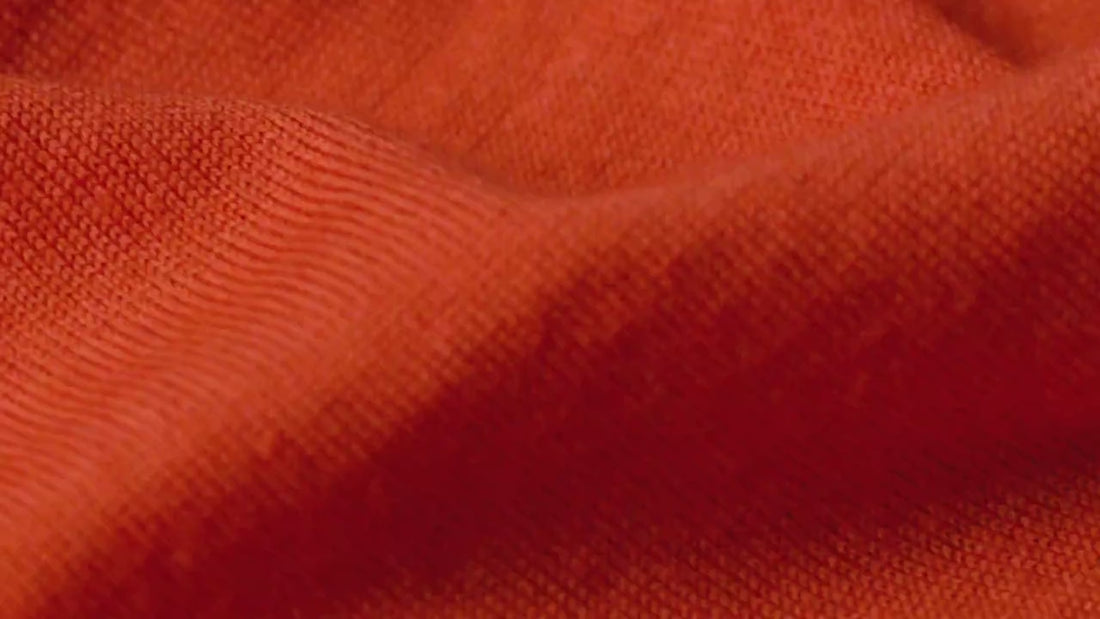 Red knit fabric made with 100% Total Easy Care Merino Wool