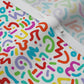 Doodle Multicolor+White Perennial Sateen Grand Printed Fabric by Studio Ten Design