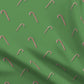 Candy Canes on Solid Green Printed Fabric by Studio Ten Design