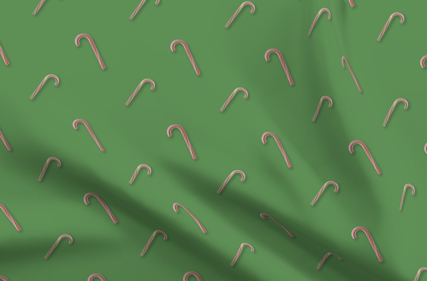 Candy Canes on Solid Green Printed Fabric by Studio Ten Design