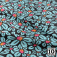 Flower Pop! Black Printed Fabric by Studio Ten Design