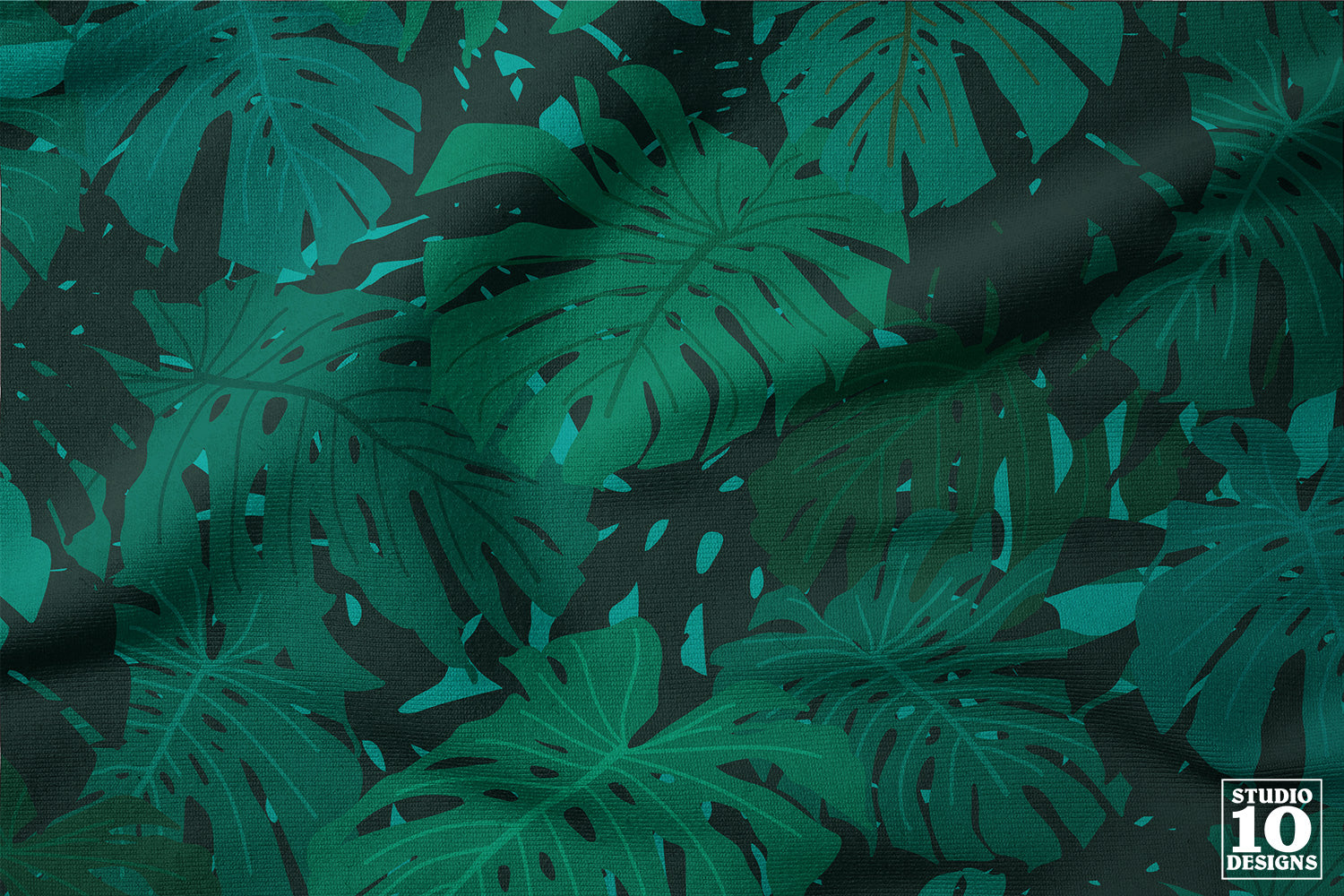 Monstera Madness Green Printed Fabric by Studio Ten Design