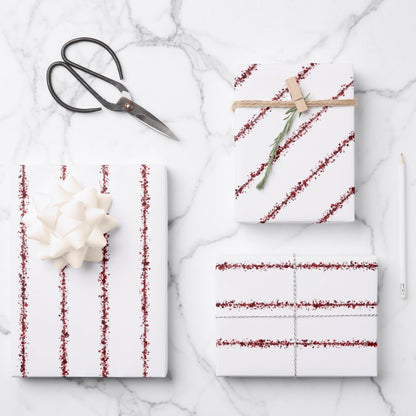 Juego de sábanas de papel de regalo a rayas con salpicaduras de sangre